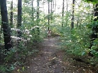 chubby girl with big booty walking nude in forest