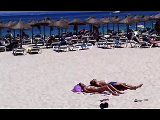 Beach Sun Bathing Couple